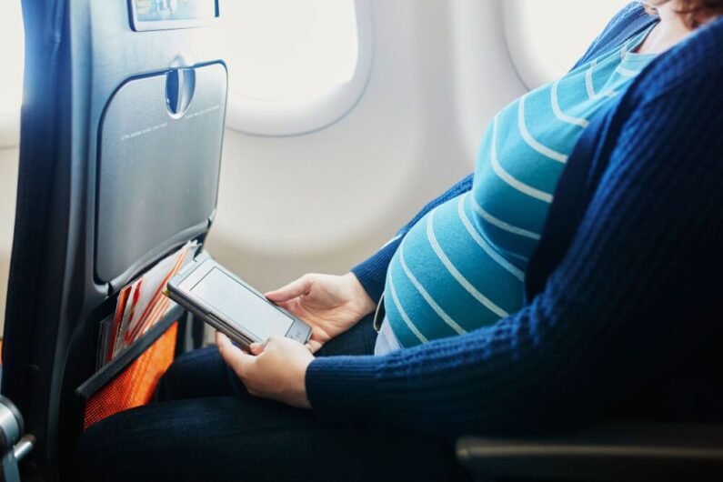 Pregnant woman traveling safely and comfortably during pregnancy