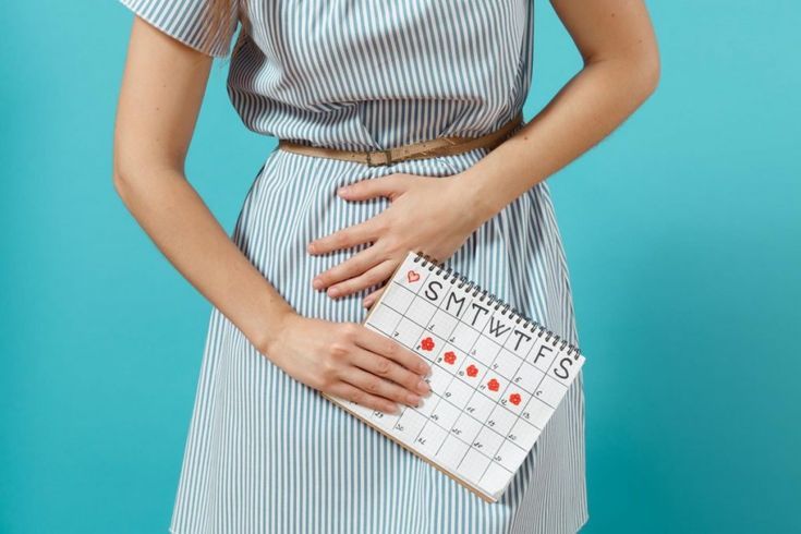 Woman consulting gynecologist for irregular periods