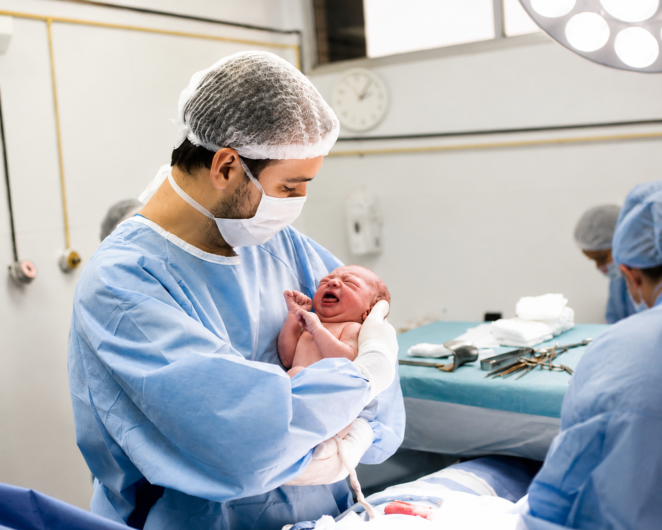 Paediatric orthopaedic surgeon performing minimally invasive keyhole surgery on a child at Orange Health Care Wakad.